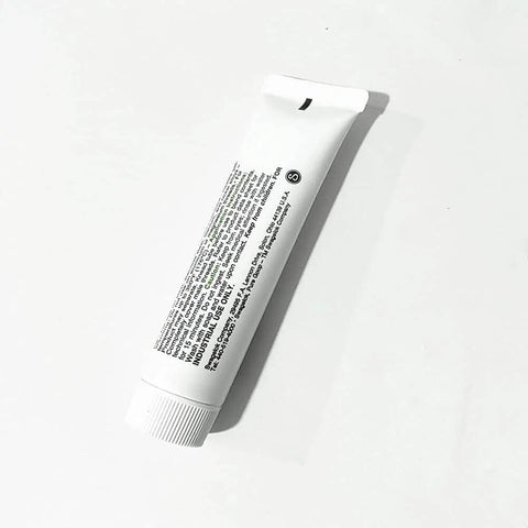 Pure Goop waterjet tools adhesive tube, white squeeze tube with ribbed cap