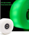 Lit Up Quad Roller Skate Wheels With ABEC Nine Bearings 32mm By 58mm Durable Durathane, glowing green wheel with 82A elasticity.