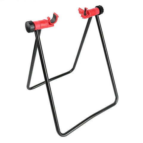 Garage Ready Vertical Triangle Bike Stand For Indoor Parking And Maintenance with red clamps, black metal, space-saving design