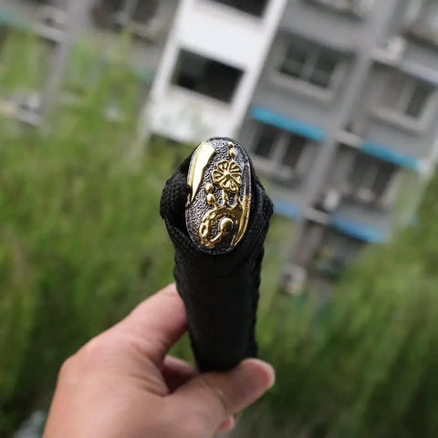 Close-up of DIY Katana Handle Kit Tsuka 10.2 Inch With Alloy Copper Iron Fittings featuring decorative gold end cap.