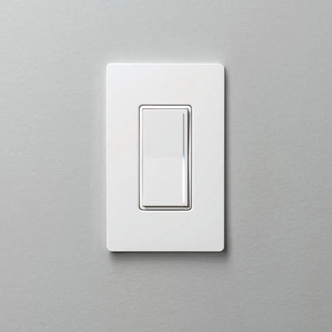 Sleek White Companion Dimmer Switch Designed For No Sweat Multi Location Wiring And Flawless Pairing With Sunnata Pro LED Plus Controllers Chill Smooth Dimming Easy Retrofit Fix on a grey wall.