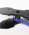 Brake caliper press tool with blue handle and black plates for automotive brake repair (side view)