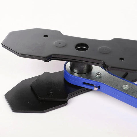 Brake caliper press tool with blue handle and black plates for automotive brake repair (side view)