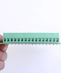 Close-up view of 8 Channel Voltage Level Converter Module From 24V To 3V3 For MCU And PLC PNP NPN Signal Translator Handy PCB Board held by hand