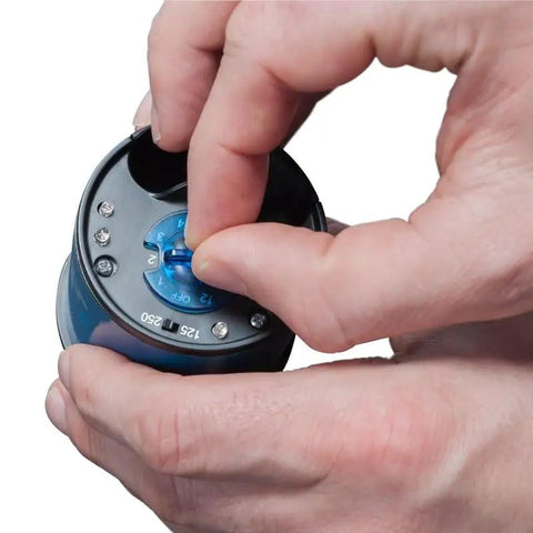 Hands adjusting 125 Em2 Bearing Grease Heavy Duty Industrial Lubricant for Bearings and Equipment, showcasing ease of use.