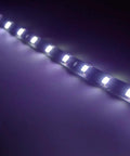 Close-up of glowing 12V Waterproof LED Underbody Light Strip Kit 1 Ft Length 12 LEDs Per Strip Self Adhesive for cars and motorbikes
