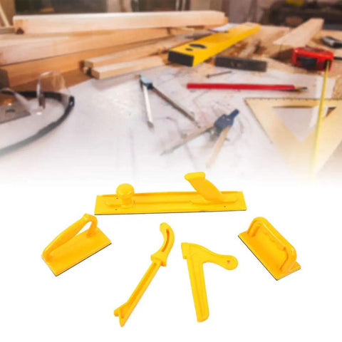 Five Piece Plastic Safety Push Block Set For Woodworking Router Tables And Household Use Includes Short Push Blocks Long Push Block V Stick Push Stick With Rubber Bottoms For Stable Accurate Workpiece Handling displayed on a workbench