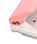 Ultimate Handheld 3-Hole Paper Puncher with 5-Sheet Capacity, close-up view showing durable metal build and punch mechanism.