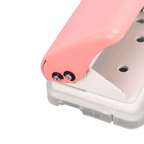 Ultimate Handheld 3-Hole Paper Puncher with 5-Sheet Capacity, close-up view showing durable metal build and punch mechanism.
