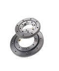 Model 011.10.150 Cross Roller Slewing Swing Ring Bearing With External Gear Option stacked view showing precision machined steel gears