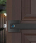 Bulletproof Zinc Alloy Smart Door Lock With Zero Hassle Fingerprint Access And Integral Emergency Power Port For Knockout Keyless Home Security And Straight Forward Handle Setup on a wooden door.