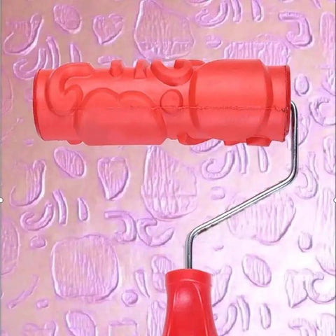 Killer DIY Doodle Dinosaur Wall Printing Roller with High Density Microfiber Cover, red roller tool against pink embossed wall.