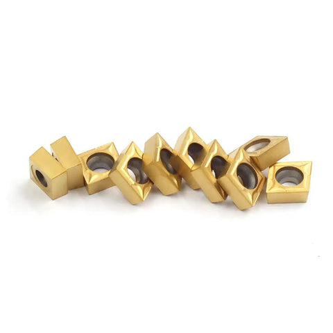 CCMT09T304 Carbide Turning Inserts Multilayer Coated For CNC Lathe Replacement Cutters arranged in a row.