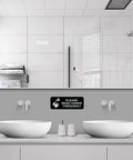 Rock Solid Restricted Area Sign For Business Safety Lockdown 3 x 8 Inch in a modern bathroom above sinks.