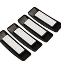 Set of four Self Stick Instant Cabinet Drawer Handle Multipurpose Stick On Handle in black plastic with smooth surface.