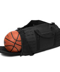 40L Military Tactical Duffle Bag For Men With Shoe Compartment holding a basketball, made of black 900D polyester with MOLLE webbing.