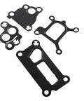 Top Shelf Engine Overhaul Cylinder Head Gasket Set For TwoLiter Turbo Evoque And Lr2 Models Cross Reference Part Numbers Lr024975 And Lr025008 showing four black gaskets for engine overhaul.