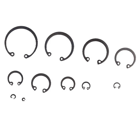 Various sizes of snap rings from 300 Piece Snap Ring Set In Alloy Steel With Pro Grade Durable Plastic Storage Case.