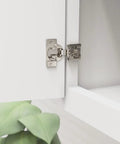 Heavy Duty Self Closing Face Frame Cabinet Hinges, 3/4 Inch Overlay Compact Concealed Design close-up view on white cabinet door.