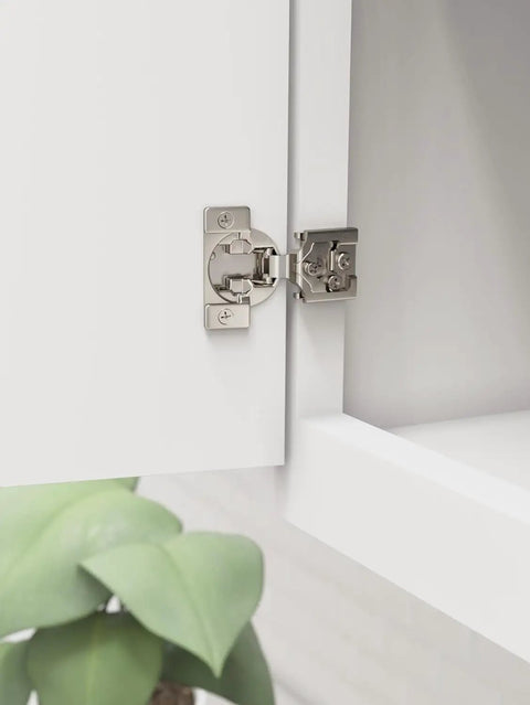Heavy Duty Self Closing Face Frame Cabinet Hinges, 3/4 Inch Overlay Compact Concealed Design close-up view on white cabinet door.