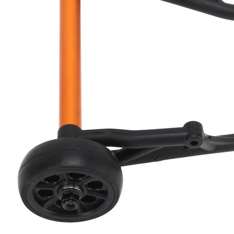 Close-up of a black wheel on the RC Wheelie Bar Kit for ZD Racing MX 07 4WD 1/7 Scale RC Truck with double wheel stability upgrade.