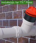 PlugAll pipe test plug with red cap installed on white PVC drain pipe (1-1/2 in)