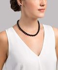 Black Akoya Japanese Pearl Necklace for women in 14K gold strand, 18 inch, featuring 8.5 to 9.0 mm genuine cultured pearls on model.