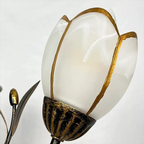 Frosted glass shade close-up of Farmhouse Wrought Iron 4 Light Chandelier In Bronze Finish, Rustic Flower Style Ceiling Fixture
