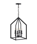 Chic Rustic Black 4 Light Chandelier With Metal Cage Pendant Adjustable Chain Hanging Light Fixture For Kitchen Island And Dining Room Farmhouse Lantern Style Ceiling Light With Modern Industrial Edge hanging from ceiling.
