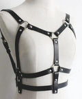 Adjustable Black Leather Chest Harness And Waist Chain Belt For Rave Festivals Nightclub Wear Sexy Belly Bra Streetwear Accessory For Women Serving That Baddie Energy, side view on mannequin.