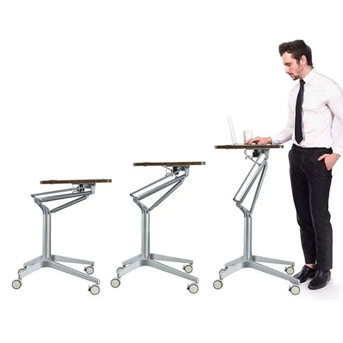 Totally Adjustable Pneumatic Sit Stand Rolling Laptop Desk Cart with ergonomic walnut platform and adjustable height.
