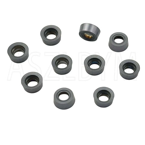 11-piece set of gray round carbide inserts with central holes for milling/lathe tools