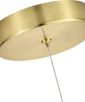 Close-up of antique brass ceiling mount with cable for Integrated LED Pendant Light In Antique Brass With White Glass Shade.
