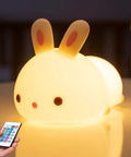 Bunny Squishy Night Light For Kids With Remote, 16 Colors And 5 Brightness Levels, illuminated soft silicone bunny with hand-held remote.