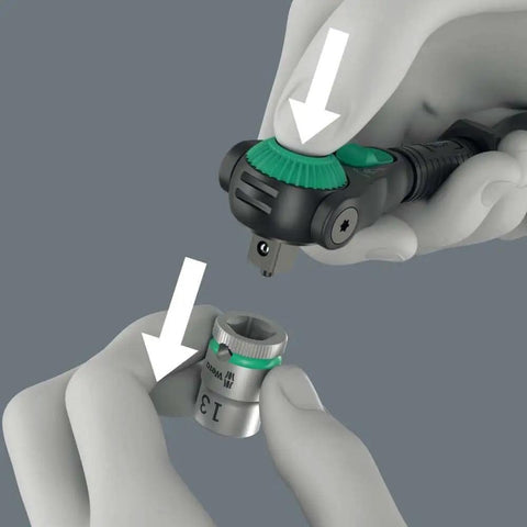 Zyklop Speed Black Edition 8000 A Professional Ratchet Set With Green Finish, quick-change socket detail being attached by hand.