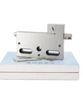 Beefy High Precision 4 Jaw Wire EDM Vise with stainless steel jaws on box, 0 to 100mm opening range, metalworking tool for EDM and milling