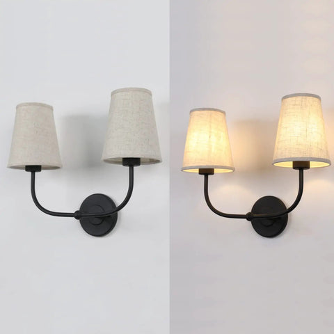 Two Light Wall Sconces With Funnel Linen Fabric Shades Vintage Modern Metal Wall Lamps unlit and lit in neutral setting side by side