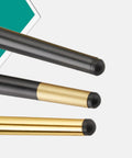 Close-up of Heavy Duty Iron Furniture Caster Legs With Ball Bearing Wheels in black and gold finish, designed to raise couches and beds.
