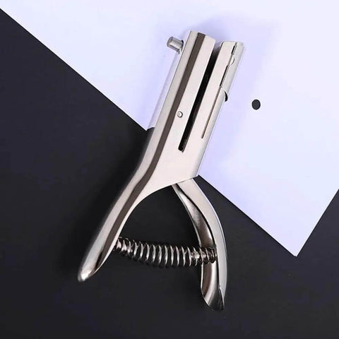 One Hole Metal Punch Tool For Crafts On The Go Circle Slot Handheld Punch in use on paper, showing 3mm hole size, chrome-plated zinc