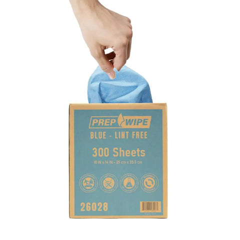 Hand pulling blue towel from Prep Wipe Lint Free Towels Heavy Duty Cloths For Household And Industrial Use Disposable Rags Nonwoven Wipes 300 Pack 9 By 17 Inches Blue Ultra Low Lint For Painting Prep And Tough Cleaning Jobs box