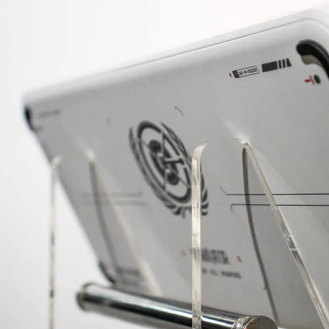 Two Tier Keyboard Display Stand In Clear White Acrylic For Two Mechanical Keyboards Storage And Display Shelf Easy Assembly No Tools Required Keeps Your Desk Lookin Sharp Sleek Desk Organizer For Home Office, side view with tablet.
