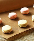 10 Pack PTFE Teflon Sheets For Heat Press 16x24 Inches with macarons on non-stick surface for transfers and sublimation.