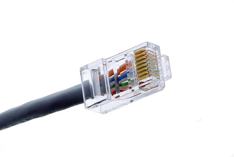 Close-up of an RJ45 Ethernet cable plug, highlighting wire arrangement and clear connector, part of Telemaster Modular Plug Crimp Tool.
