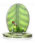 Heavy Duty Elongated Toilet Seat With Smooth Slow Close Lid And Rock Solid Metal Hinges Ergonomic Shape For Super Comfort Wear Resistant Coating Easy Install Fits Oval Toilets with green leaf design and ladybug.