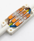 Heavy Duty Junction Box Tailored For Standard 221 Lever Nuts Rock Solid Inline Wire Splice Cover Case Supporting 3 Conductor Cables with wires visible.