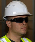 Worker wearing Pro Grade Safety Glasses Kit With Full Frame Lenses And Breakaway Lanyard Eight Piece Set for extra protection