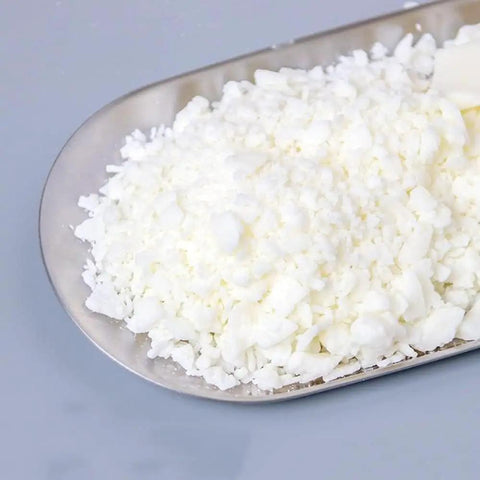 White Soy Wax Flakes For Candle Making 2 Pound Bulk 100 Percent Natural Soy Wax Premium Quality DIY Candles Clean Burn No Black Smoke Easy Melt Great For Beginners And Pros on a metal tray