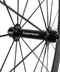 Close-up of hub and spokes on 50mm Carbon Clincher Wheelset For 700c Road Bikes With Silver Decal Dope Aero Performance UCI Approved EN Tested