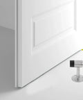 Heavy Duty Zinc Alloy Door Stopper For Bedroom And Balcony Doors Quiet Windproof Design With Rubber Head Pet Safe next to open white door