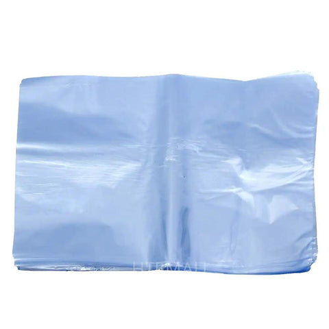 Hassle Free 100 Pack Clear Pvc Heat Shrink Bags 7X10 Inches, open flat, ideal for wrapping gifts, soaps, and DVDs.